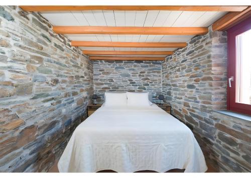 Letto o letti in una camera di Kythnos Keli