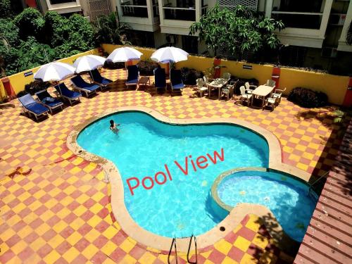 Bazén v ubytování Krish Hotel Baga nebo v jeho okolí