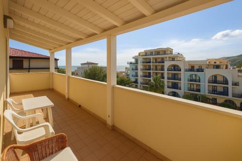 a balcony with a view of a building at Affitti Brevi- MEDITERRANEO in Crotone