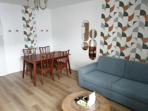 Ruang duduk di Appart-Hôtel Rouillac