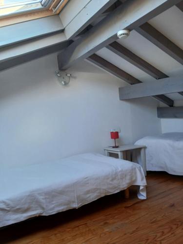 Katil atau katil-katil dalam bilik di les deux clochers ,chambre d hotes