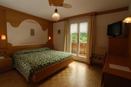 TV a/nebo společenská místnost v ubytování Charme Hotel Nevada