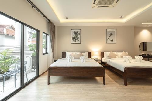 En eller flere senge i et værelse på Asok house Sukhumvit27 Free BF