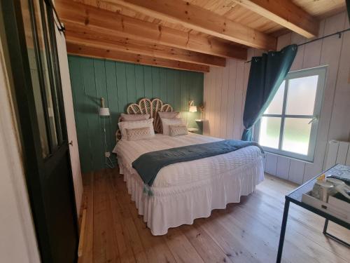 Ένα ή περισσότερα κρεβάτια σε δωμάτιο στο B&B Restaurant La Rivière