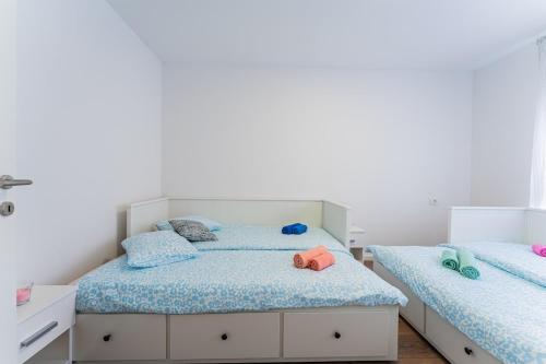 Katil atau katil-katil dalam bilik di Flex SelfCheckIns 99 - 2 Bedrooms - Parking - Loggia