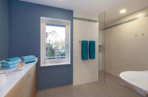 Ένα μπάνιο στο Appartements Bank Am See