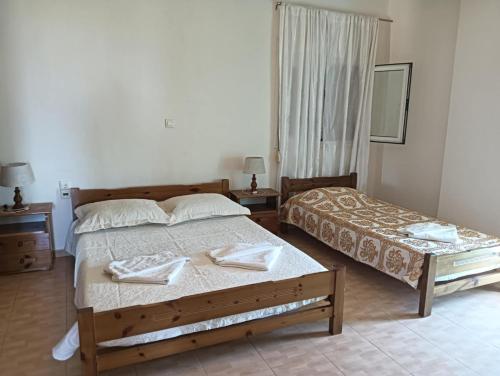 Ένα ή περισσότερα κρεβάτια σε δωμάτιο στο Xenonas house 365