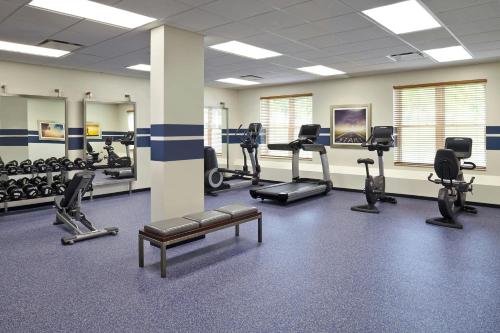 a gym with treadmills and cardio equipment in a room at Four Points by Sheraton Moncton in Moncton