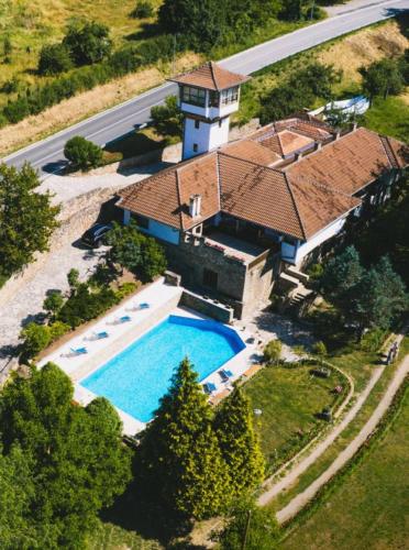 an overhead view of a house with a swimming pool at Heritage Home Ustikolina in Foča