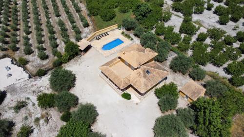 an overhead view of a house with a swimming pool at Aldora Rural Casa con piscina in Moratalla