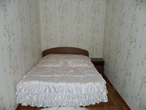 Ένα ή περισσότερα κρεβάτια σε δωμάτιο στο MEGAPOLIS улица Плехановская 25-46