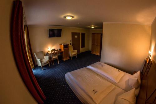 TV a/nebo společenská místnost v ubytování Hotel Blaue Ecke