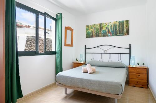 Ένα ή περισσότερα κρεβάτια σε δωμάτιο στο Bella Vista - Cactus