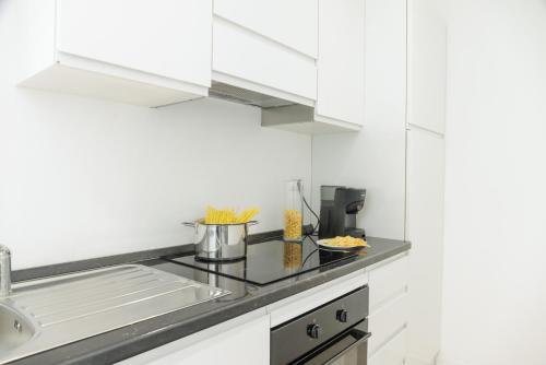 Dapur atau dapur kecil di Baia del Sole Resort