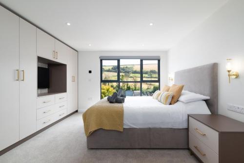 Una cama o camas en una habitación de Sunset Beach