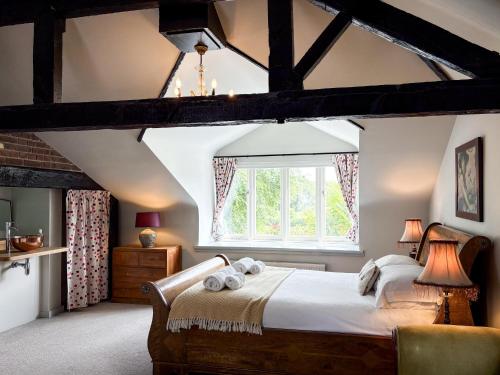 Ένα ή περισσότερα κρεβάτια σε δωμάτιο στο Greenwood Grange