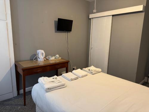 Regent Hotelにあるベッド