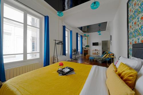 Katil atau katil-katil dalam bilik di Cosy Loft Charme/Porte Maillot