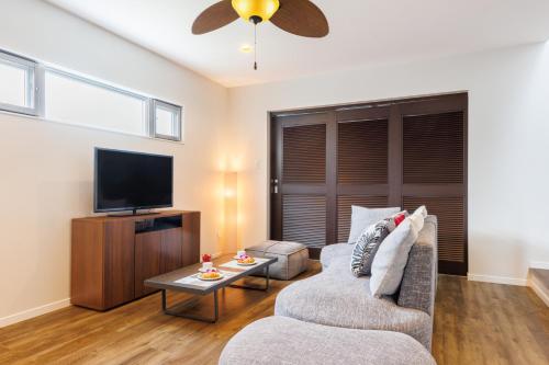 Μια τηλεόραση ή/και κέντρο ψυχαγωγίας στο Tsukasa Condo Chatan Alaha