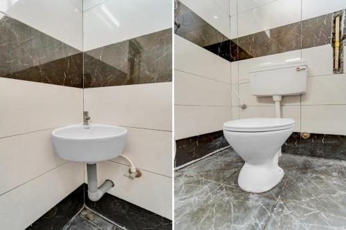 a bathroom with a toilet and a sink at Hotel O MM Home Stays in Irugūr