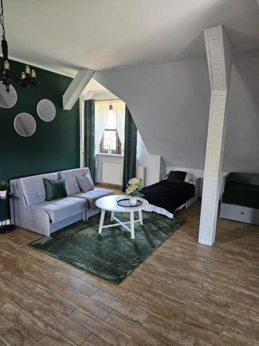 Χώρος καθιστικού στο Apartament Zielony - Dom Nasutów