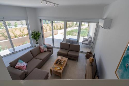 Posezení v ubytování Modern Poolside villa at Paphos