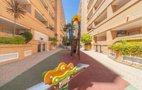 a playground in a building with a dinosaur park at 11 Nights Minimum in Cabanes