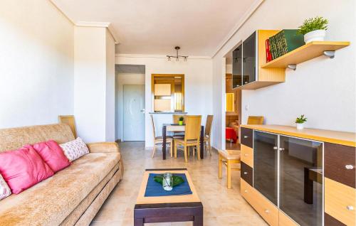 a living room and kitchen with a couch and a table at 11 Nights Minimum in Cabanes