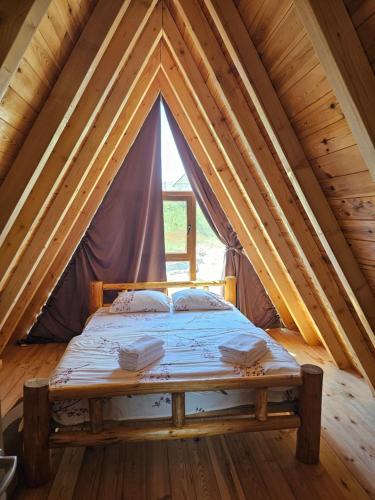 Ένα ή περισσότερα κρεβάτια σε δωμάτιο στο Mali raj Žabljak