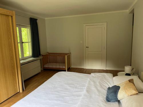 Una cama o camas en una habitación de Parelintgroen