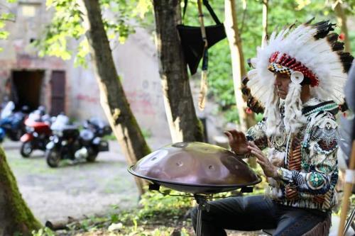 a person in an indian at Taujėnų dvaro rūmai in Towiany
