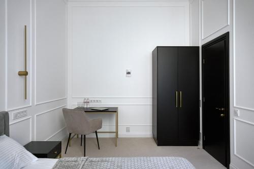 Кровать или кровати в номере Ekaterina II Hotel