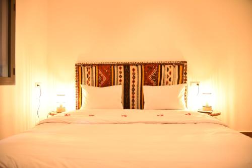 Ένα ή περισσότερα κρεβάτια σε δωμάτιο στο Auberge Prince