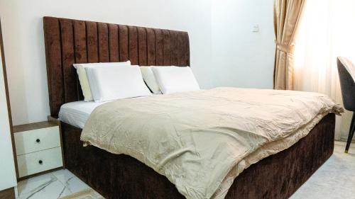 Postel nebo postele na pokoji v ubytování EEVA Maison Apartments