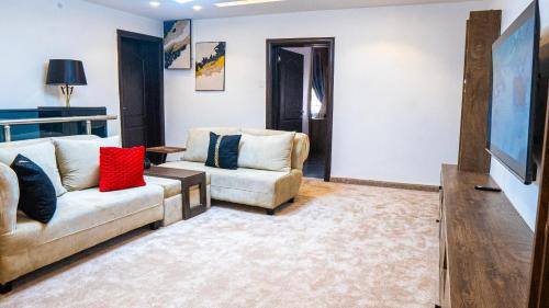 Posezení v ubytování EEVA Maison Apartments