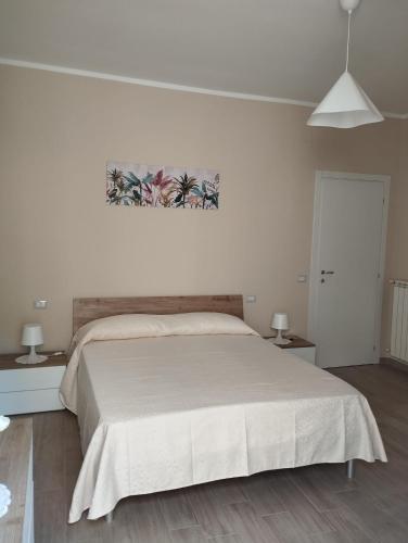 Ένα ή περισσότερα κρεβάτια σε δωμάτιο στο Casa Xenia
