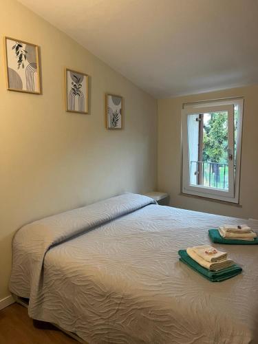 Postel nebo postele na pokoji v ubytování Casa vacanze Conca d Oro