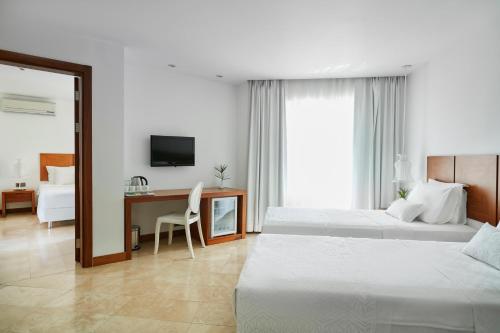 Katil atau katil-katil dalam bilik di Flow Datca Surf & Beach Hotel