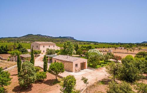 an aerial view of a house with trees at Cas Cuni in Felanitx