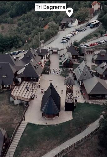 an aerial view of a building with a tent at Tri bagrema KM in Mokra Gora