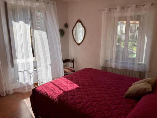 Ένα ή περισσότερα κρεβάτια σε δωμάτιο στο iL BUCANEVE