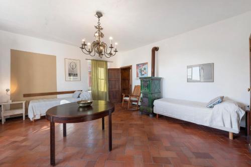 Katil atau katil-katil dalam bilik di Agriturismo Monte Pu'