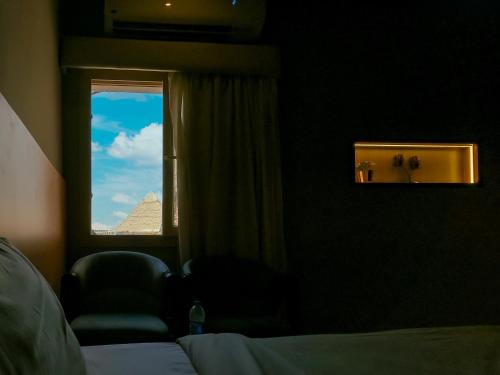 Un lugar para sentarse en Nut Pyramids Hotel