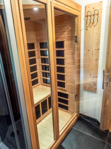 a walk in closet in a house at Woody Park Feriendorf Murau in Murau