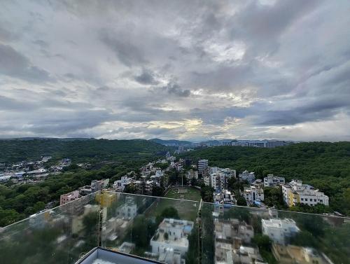 a view of a city from the top of a building at Sparsh A Luxury Experience by Stay Haven in Pune
