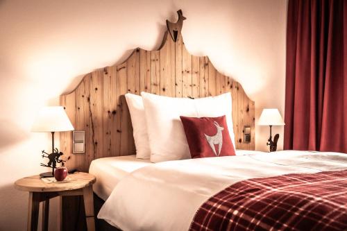 Voodi või voodid majutusasutuse Kitzhof Mountain Design Resort toas