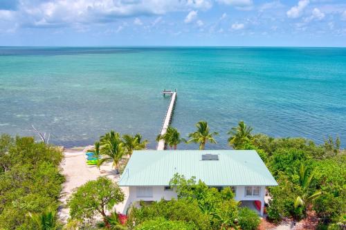 an aerial view of a house on a beach at Million Dollar View in Marathon