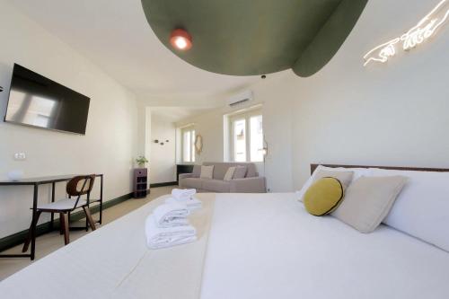 En eller flere senge i et værelse på Big Mama s Stays