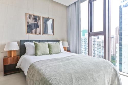 Ένα ή περισσότερα κρεβάτια σε δωμάτιο στο Blueground Seocho sauna nr Seonjeongneung SEL-37