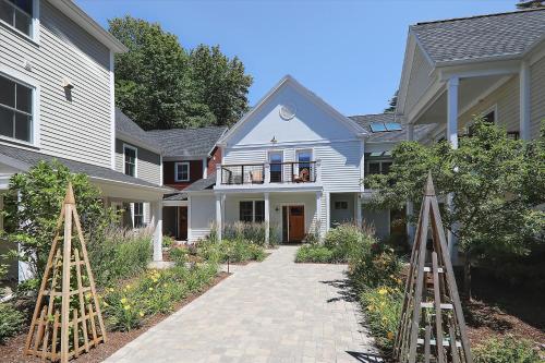a house with a walkway in front of it at Apres Chalet at Village Walk C in Stowe
